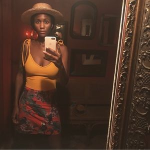 Deep V-neck yellow bodysuit XS